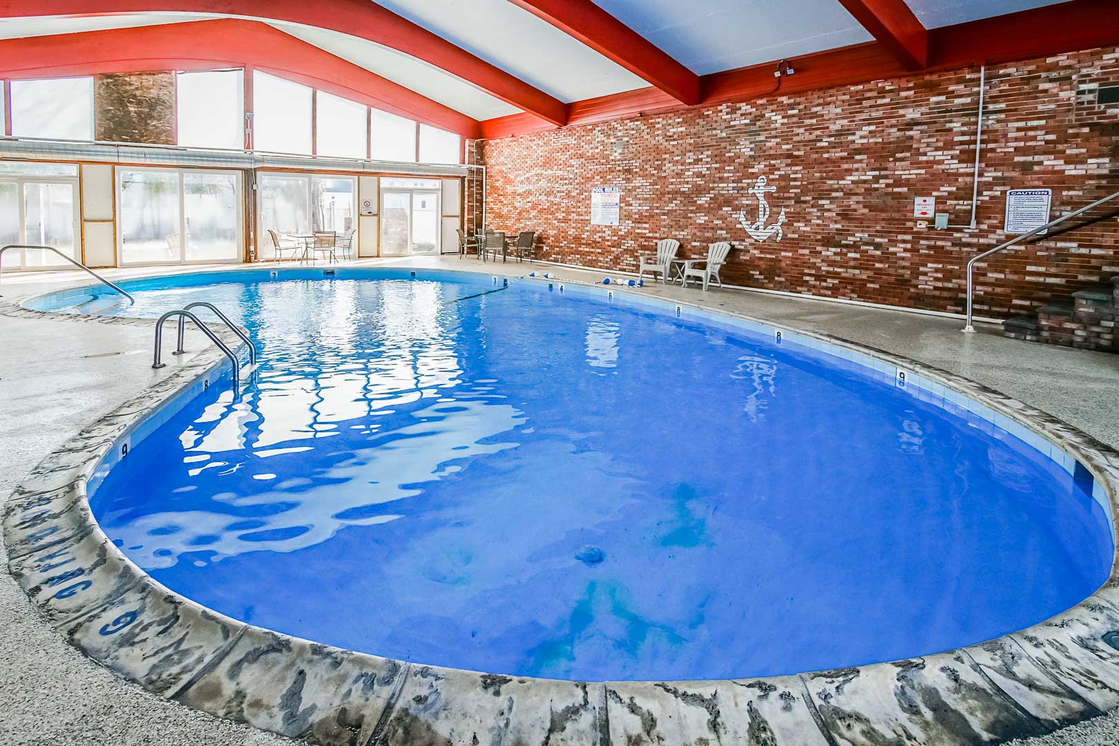 A crisp and clean indoor swimming pool at VRI's Courtyard Resort in Massachusetts.